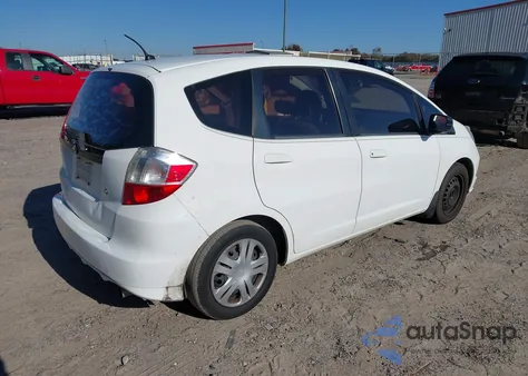 2009 Honda Fit from USA, damaged, VIN JHMGE88229S009402